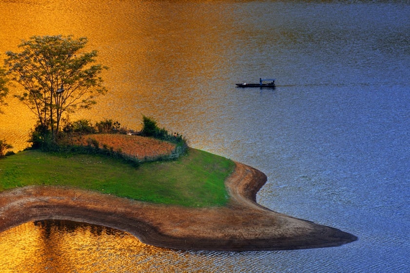 Na Hang Lake offers stunning views of lush forests