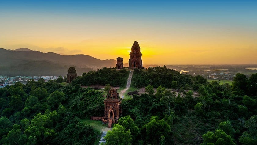 The ancient Banh It Cham Temple rising above the hills
