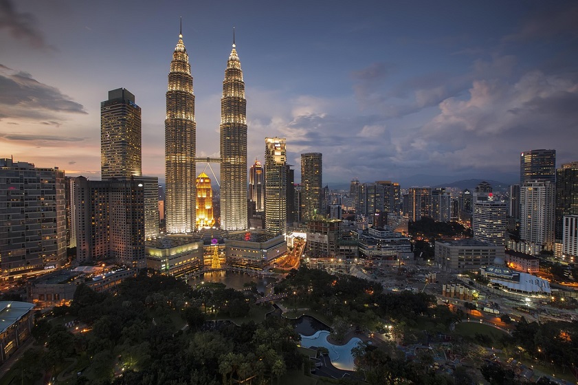 The iconic Petronas Twin Towers shine over Kuala Lumpur’s vibrant skyline 
