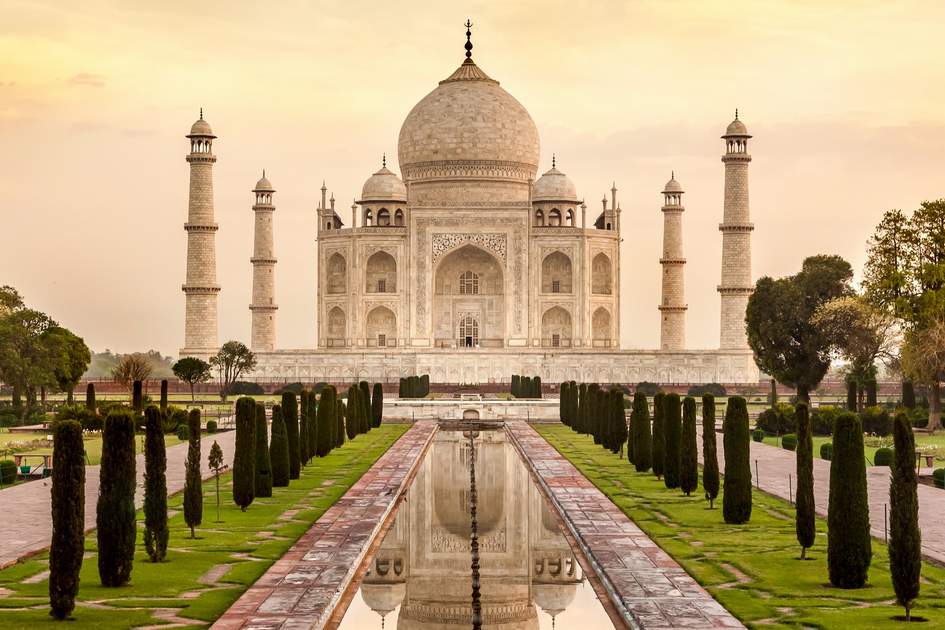The majestic Taj Mahal glows at sunrise, reflecting India’s timeless beauty