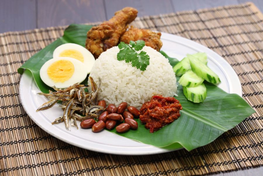 Try nasi lemak in Malaysia to discover the country’s cuisine