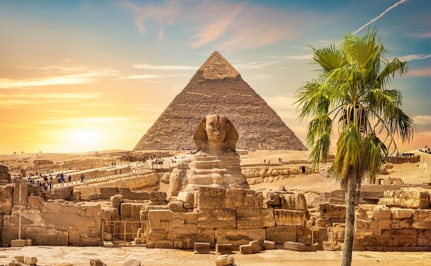 Visitors admire the majestic Pyramids of Giza in awe